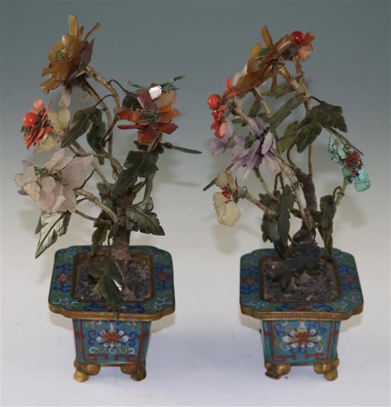 A pair of Chinese hardstone and coral mounted models of trees in cloisonné enamel jardinieres, early 20th century, 30cm, some losses